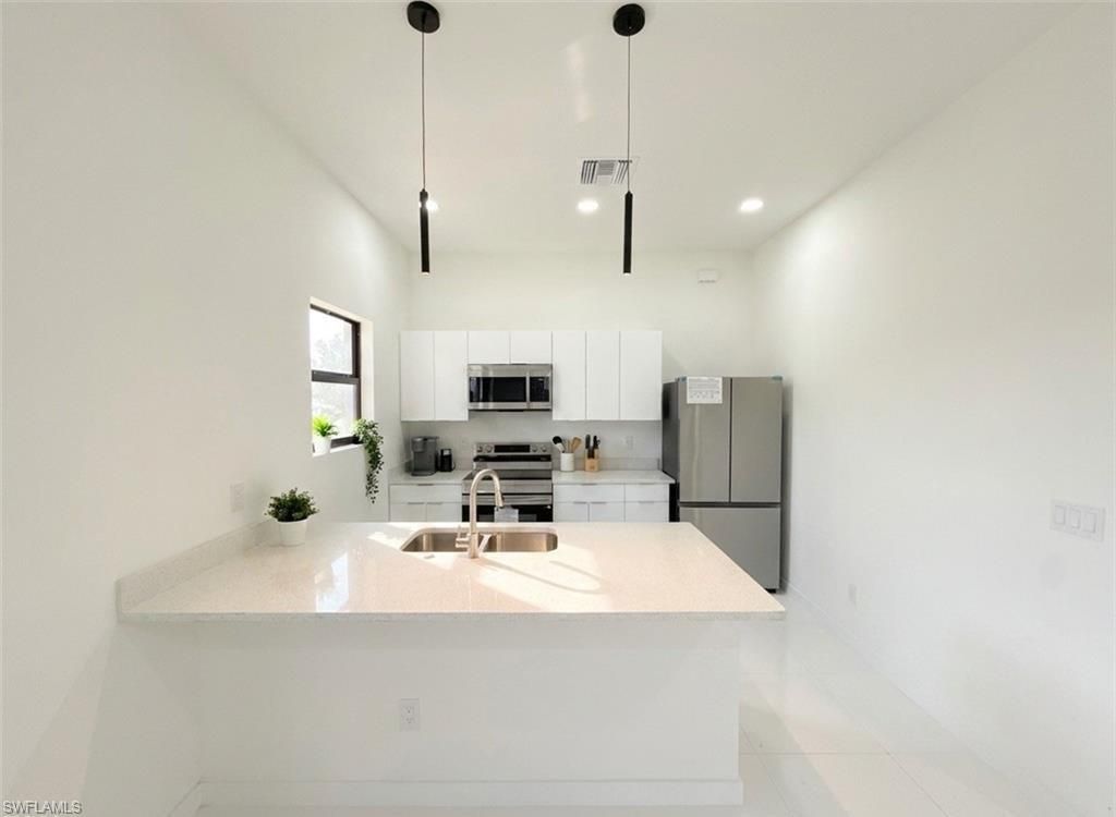 Image 11 of property listing at 2418 NW 25th ST, Cape Coral, FL 33993