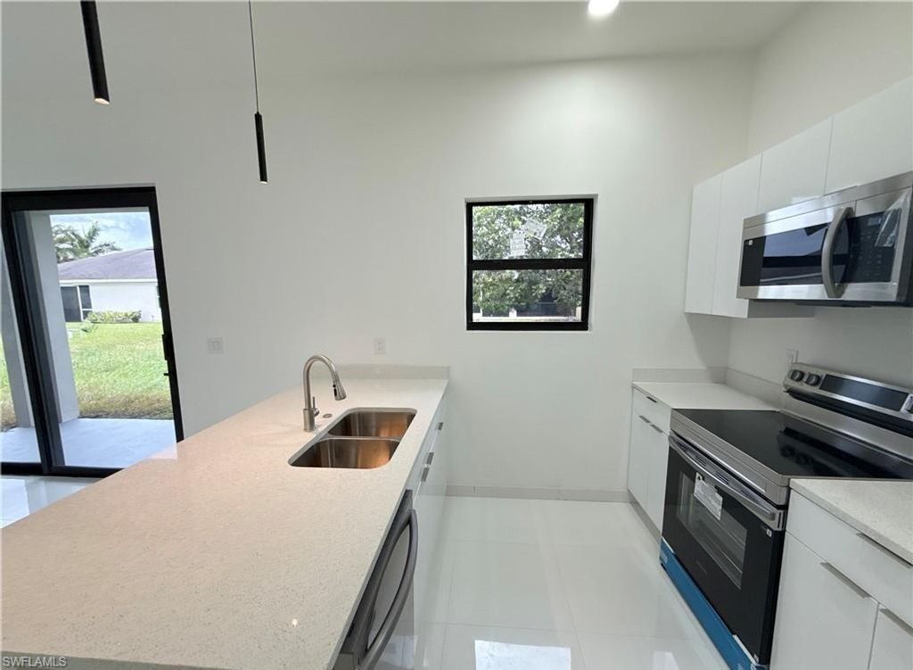 Image 12 of property listing at 2418 NW 25th ST, Cape Coral, FL 33993