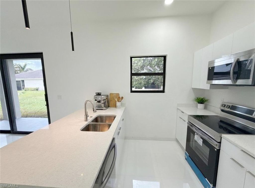 Image 13 of property listing at 2418 NW 25th ST, Cape Coral, FL 33993