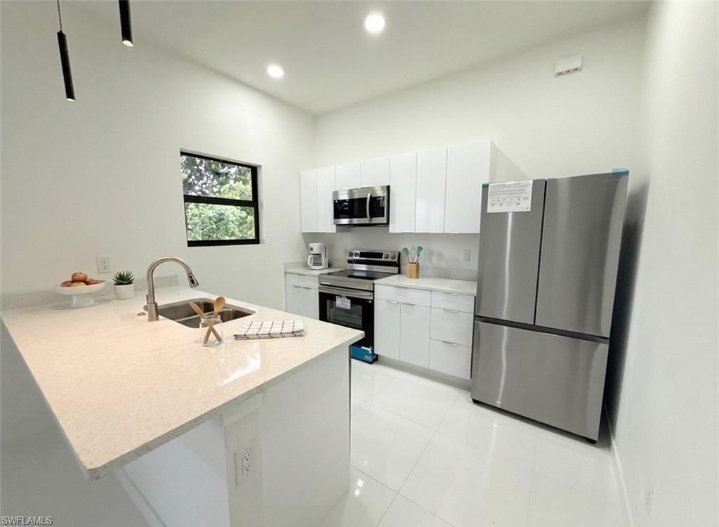Image 16 of property listing at 2418 NW 25th ST, Cape Coral, FL 33993