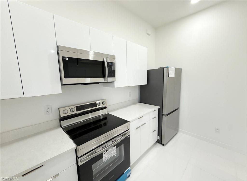 Image 8 of property listing at 2418 NW 25th ST, Cape Coral, FL 33993
