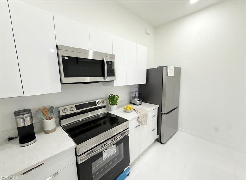 Image 9 of property listing at 2418 NW 25th ST, Cape Coral, FL 33993