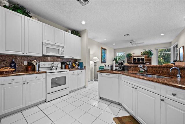 180 Egret Circle, Greenacres, FL 33413