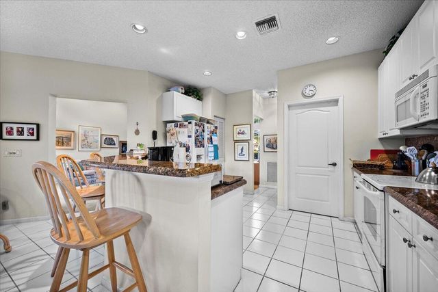 180 Egret Circle, Greenacres, FL 33413