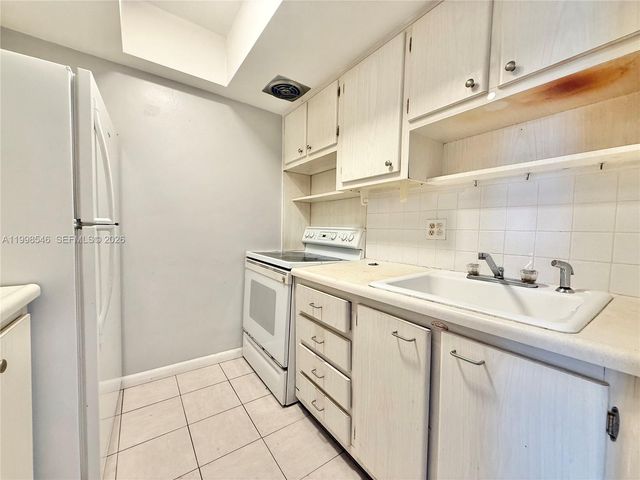 455 Golden Isles Dr 309, Hallandale Beach, FL 33009