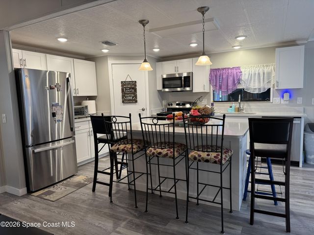 915 Hemlock Street, Barefoot Bay, FL 32976