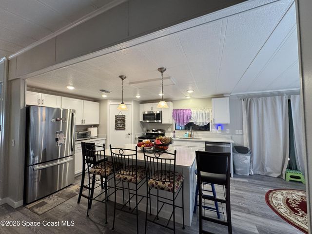 915 Hemlock Street, Barefoot Bay, FL 32976