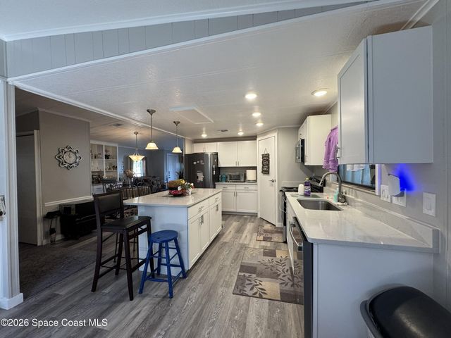 915 Hemlock Street, Barefoot Bay, FL 32976