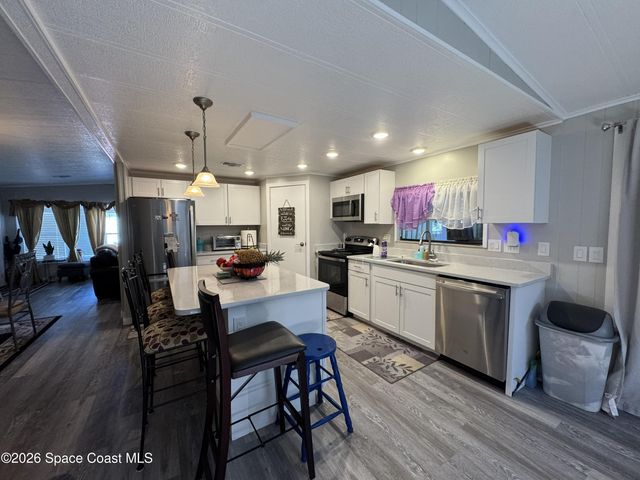 915 Hemlock Street, Barefoot Bay, FL 32976