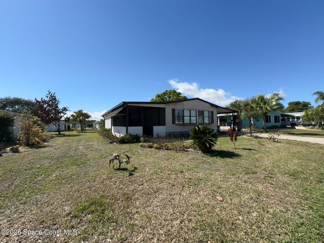 915 Hemlock Street, Barefoot Bay, FL 32976