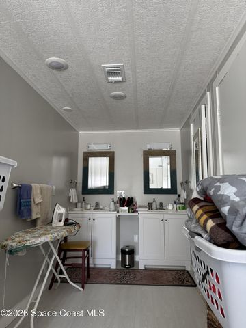 915 Hemlock Street, Barefoot Bay, FL 32976