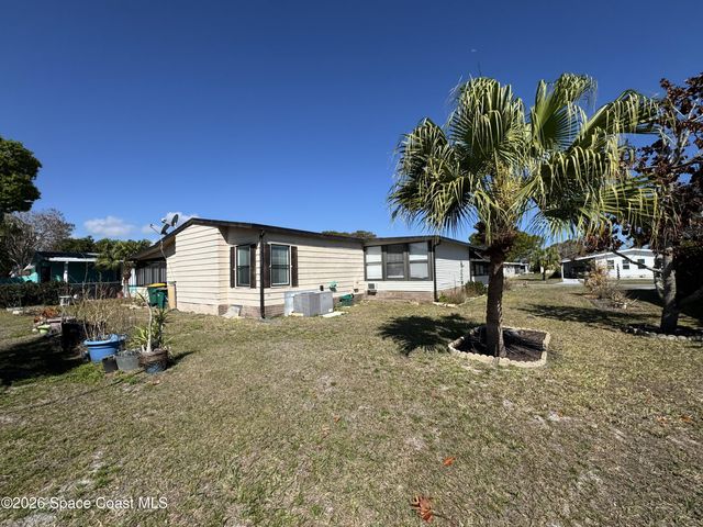 915 Hemlock Street, Barefoot Bay, FL 32976