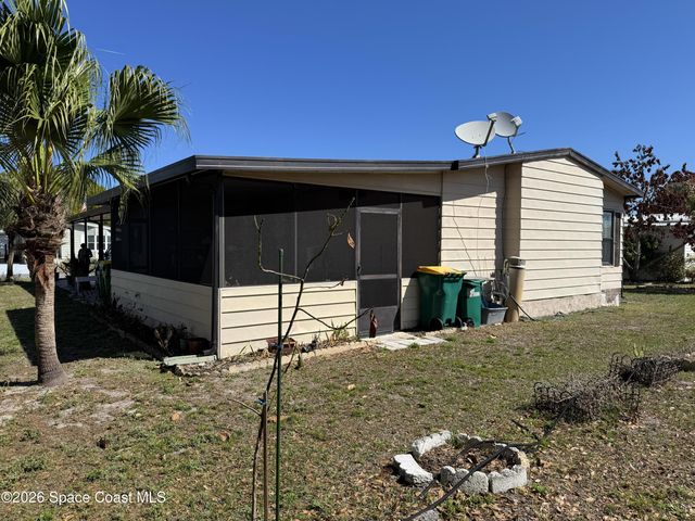 915 Hemlock Street, Barefoot Bay, FL 32976