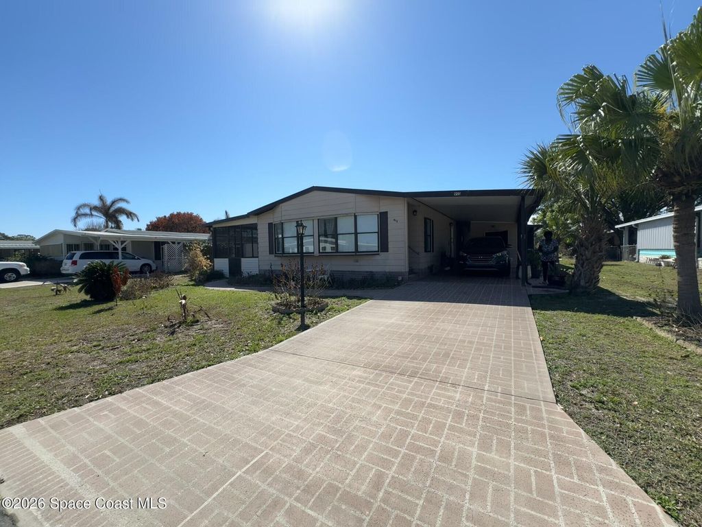 915 Hemlock Street, Barefoot Bay, FL 32976