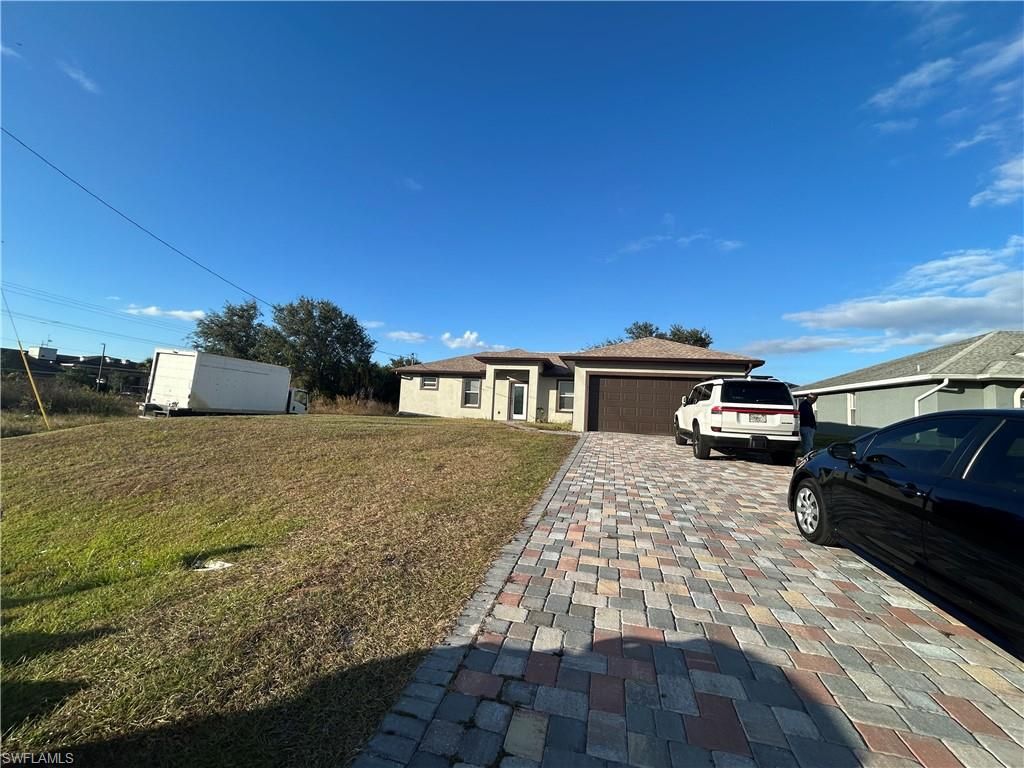 811 Milwaukee BLVD, Lehigh Acres, FL 33974