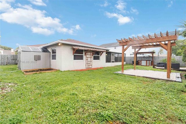 9908 NW 46th Ct, Sunrise, FL 33351