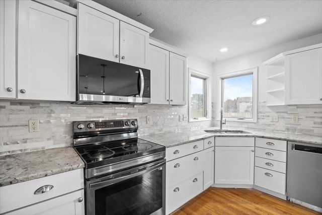 6913 Lewis Carroll Court, Johnston, IA 50131