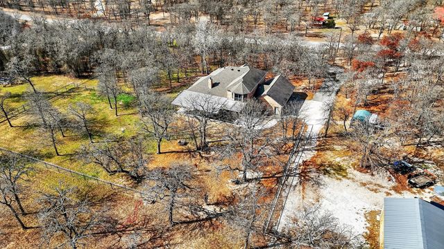 125 River Rock Court, Poolville, TX 76487