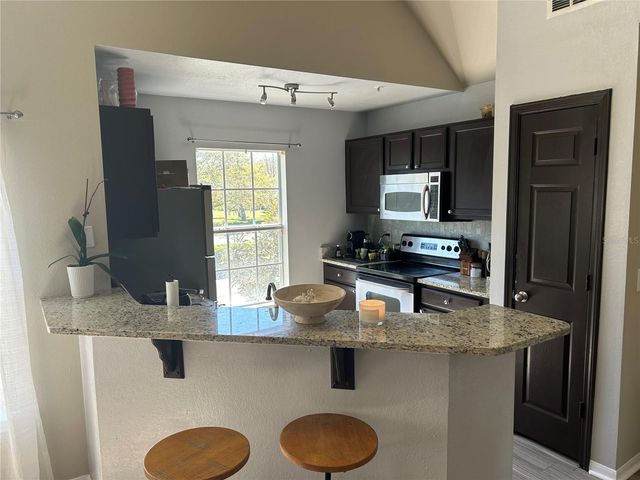 8925 LEE VISTA BOULEVARD 2704, Orlando, FL 32829