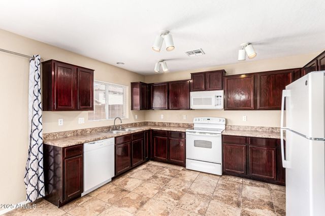 11566 W PURDUE Avenue, Youngtown, AZ 85363