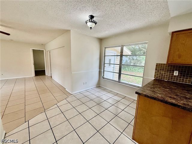 706 E 3rd ST, Lehigh Acres, FL 33936