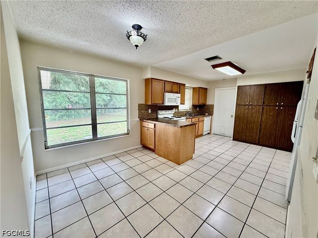 706 E 3rd ST, Lehigh Acres, FL 33936
