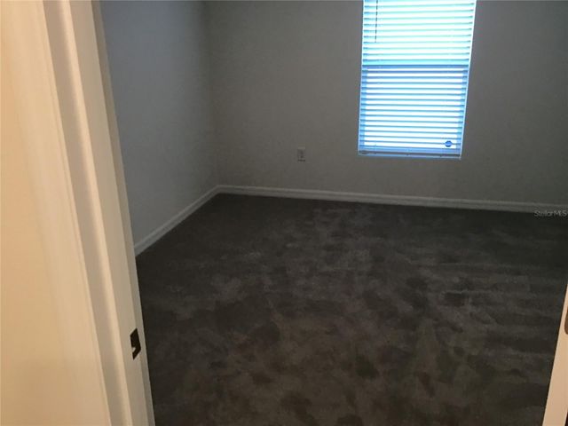 7729 ROSEWOOD GARDEN LOOP, Tampa, FL 33637