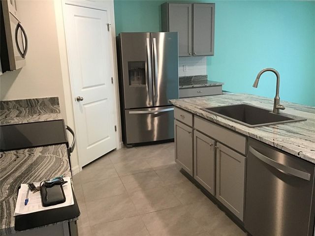 7729 ROSEWOOD GARDEN LOOP, Tampa, FL 33637