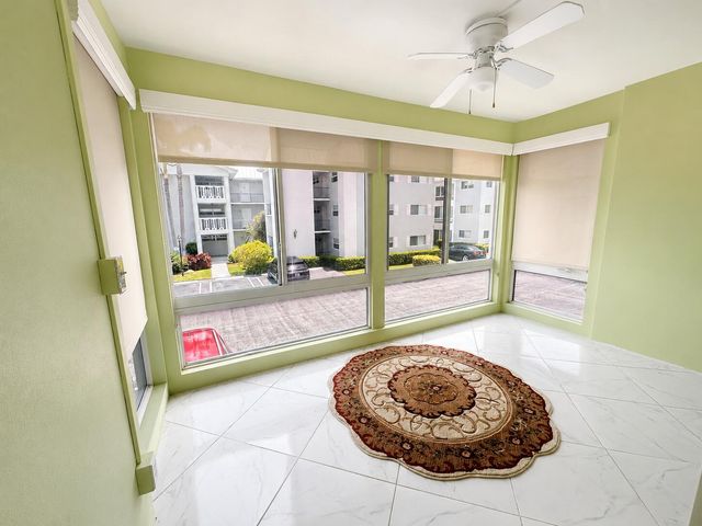 18 COLONIAL CLUB Drive 200, Boynton Beach, FL 33435