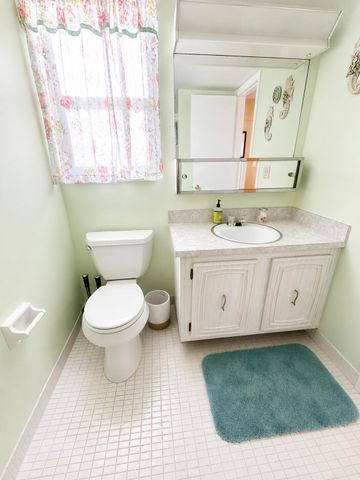 18 COLONIAL CLUB Drive 200, Boynton Beach, FL 33435