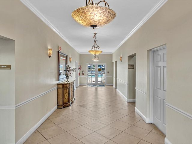 18 COLONIAL CLUB Drive 200, Boynton Beach, FL 33435