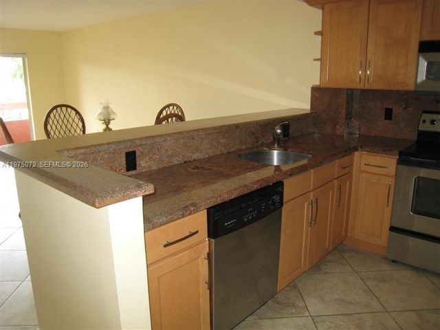 7722 Camino Real D301, Miami, FL 33143