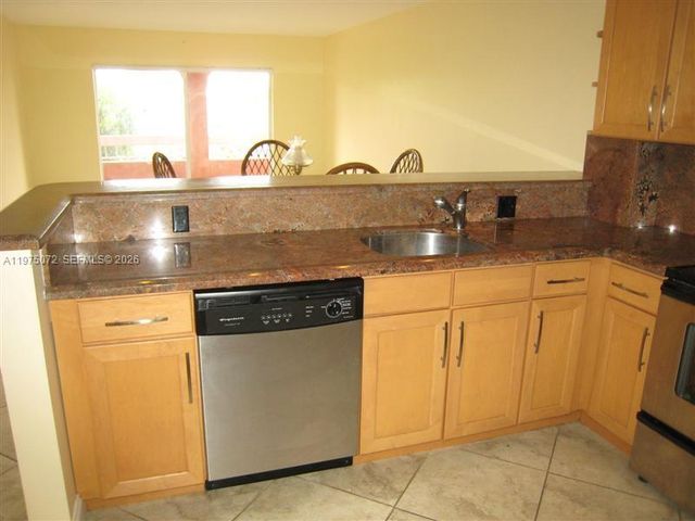 7722 Camino Real D301, Miami, FL 33143