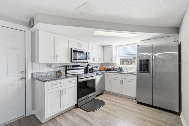 9825 LAKESIDE LANE, Port Richey, FL 34668