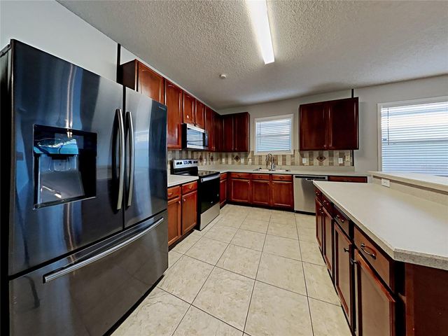 716 KNOLLWOOD DRIVE, Davenport, FL 33837