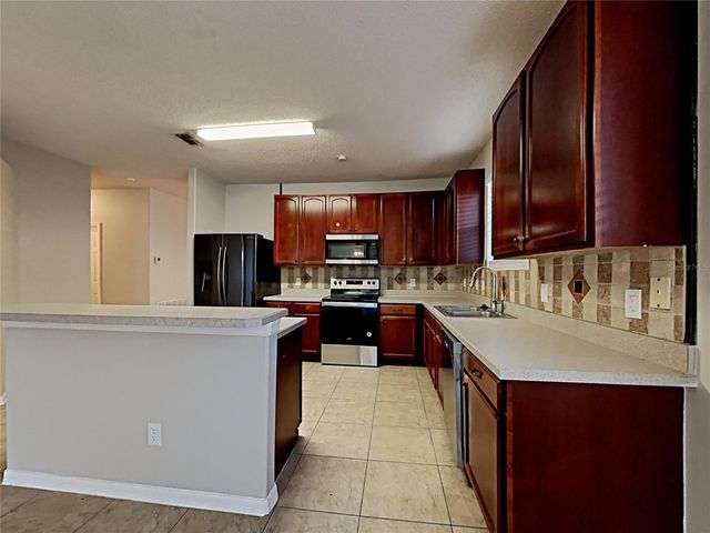 716 KNOLLWOOD DRIVE, Davenport, FL 33837