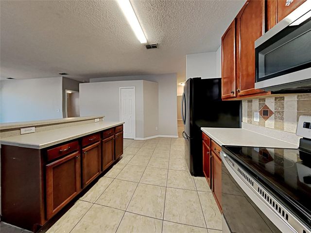 716 KNOLLWOOD DRIVE, Davenport, FL 33837