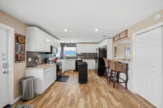 7877 White Sands Blvd, Navarre Beach, FL 32566