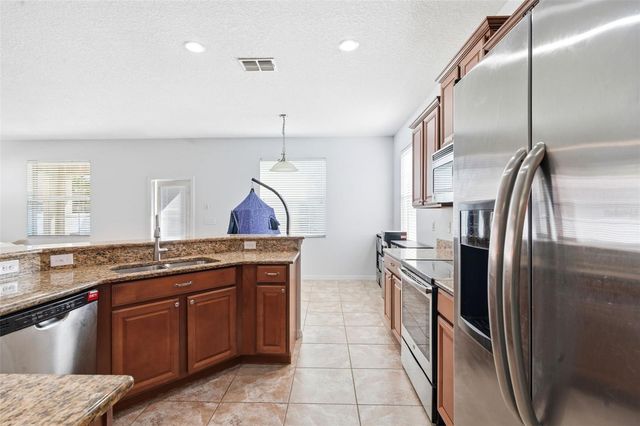 6829 SUNDROP STREET, Harmony, FL 34773