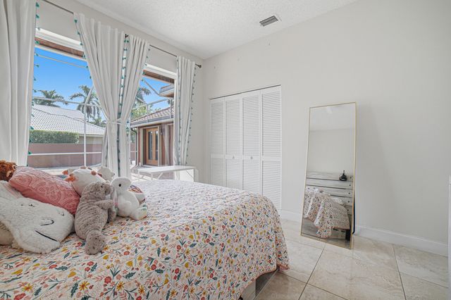 10599 SAINT THOMAS Drive, Boca Raton, FL 33498