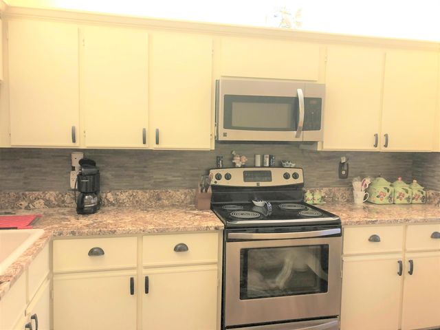 13335 TOUCHSTONE Place 103, Palm Beach Gardens, FL 33418