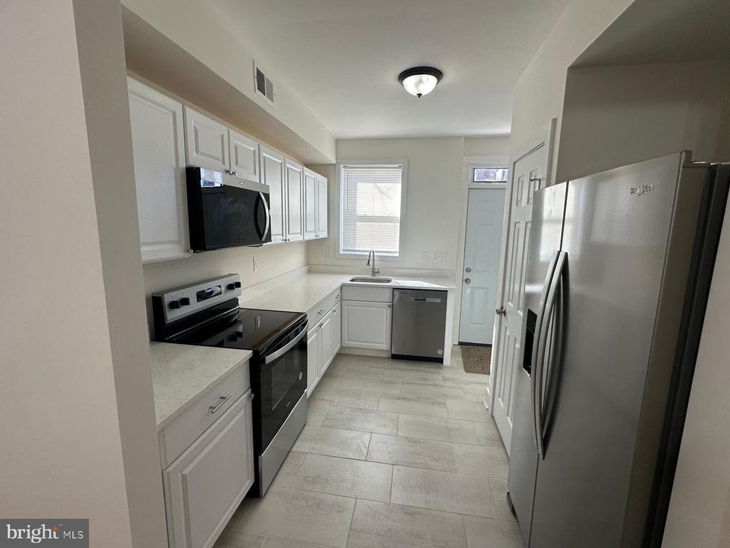 Image 1 of property listing at 1220 N POTOMAC ST, Baltimore, MD 21213