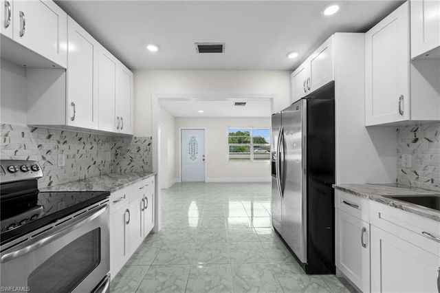 404 Leeland Heights BLVD W, Lehigh Acres, FL 33936