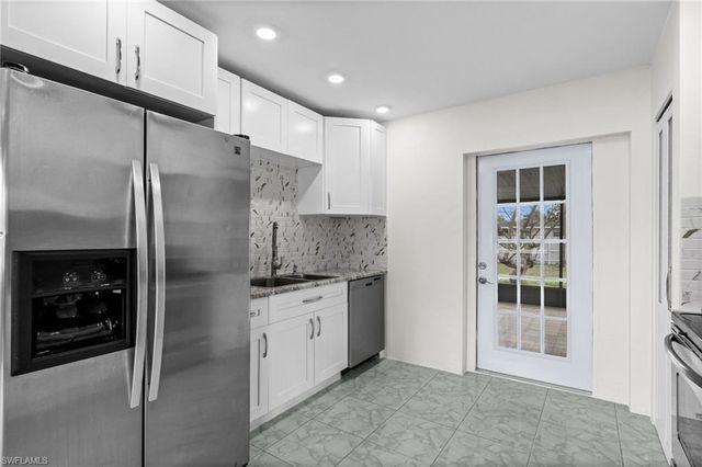 404 Leeland Heights BLVD W, Lehigh Acres, FL 33936