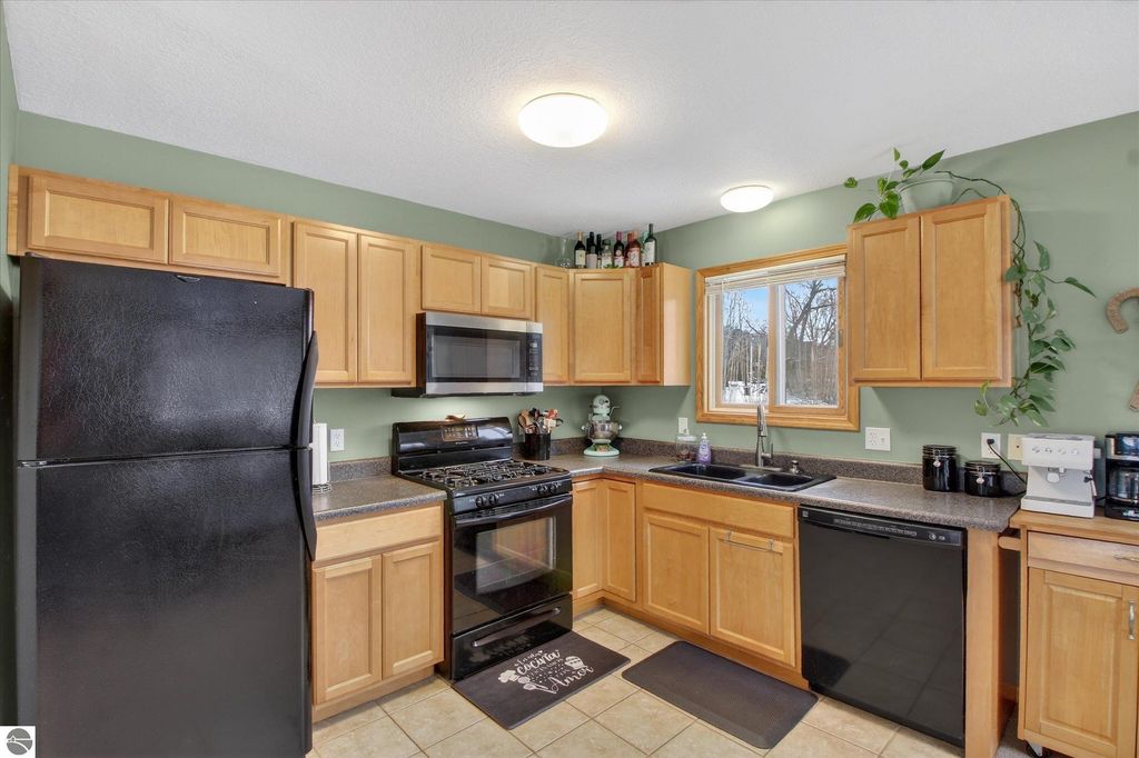 Image 13 of property listing at 740 N Rolland Road, Weidman, MI 48893