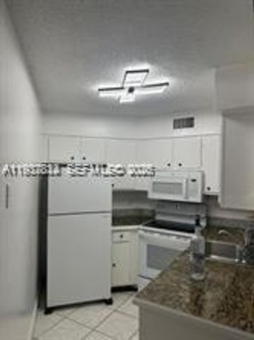 212 Lake Pointe Drive 210, Oakland Park, FL 33309