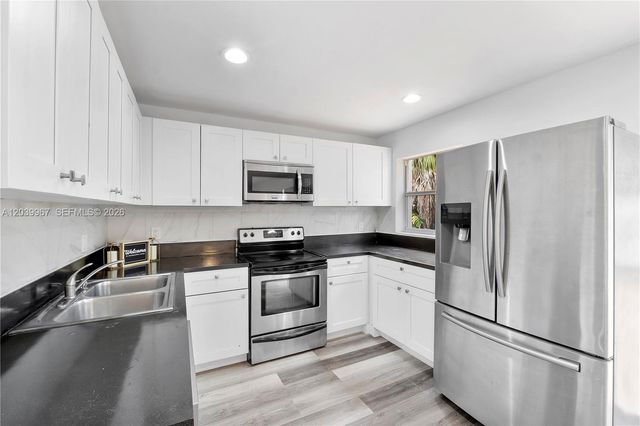 9836 NW 2nd Court, Plantation, FL 33324