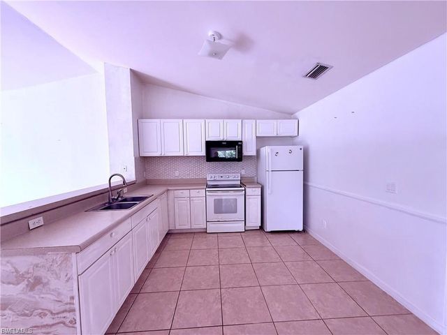 1221 E 12th ST, Lehigh Acres, FL 33972