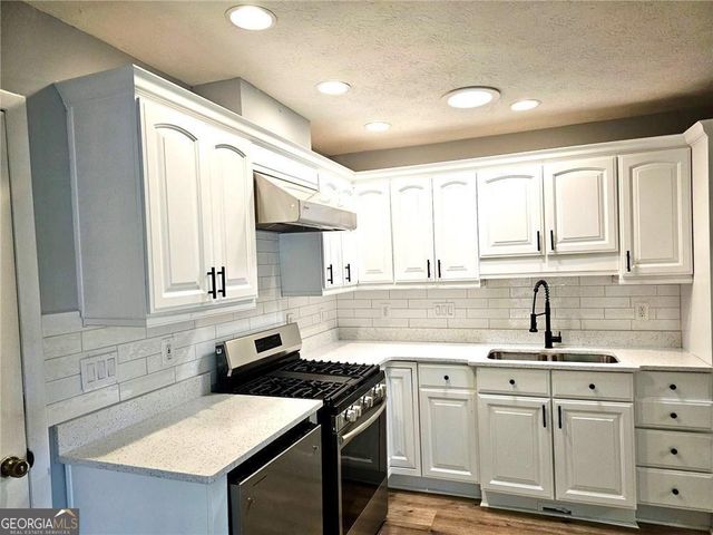 1244 Hickory Wood Drive NE, Woodstock, GA 30188
