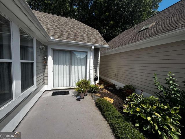 104 ROSE COTTAGE Lane, Woodstock, GA 30189